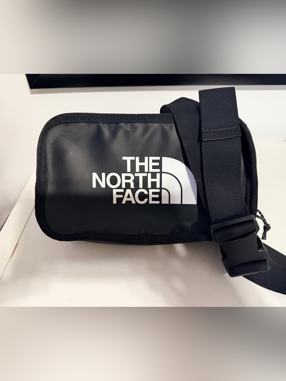 The North Face Black Belt Bag with White Logo Panel